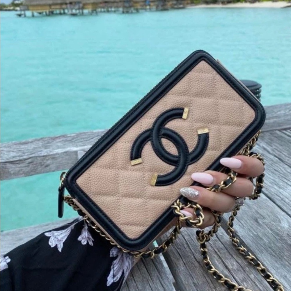 SOLD 
CHANEL Beige and Black Quilted Filigree Crossbody & Clutch